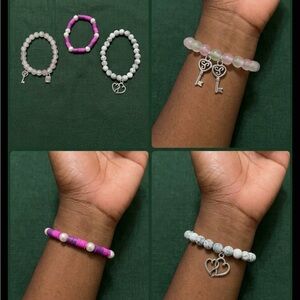 Pink and White Beaded Bracelets with Silver Charms